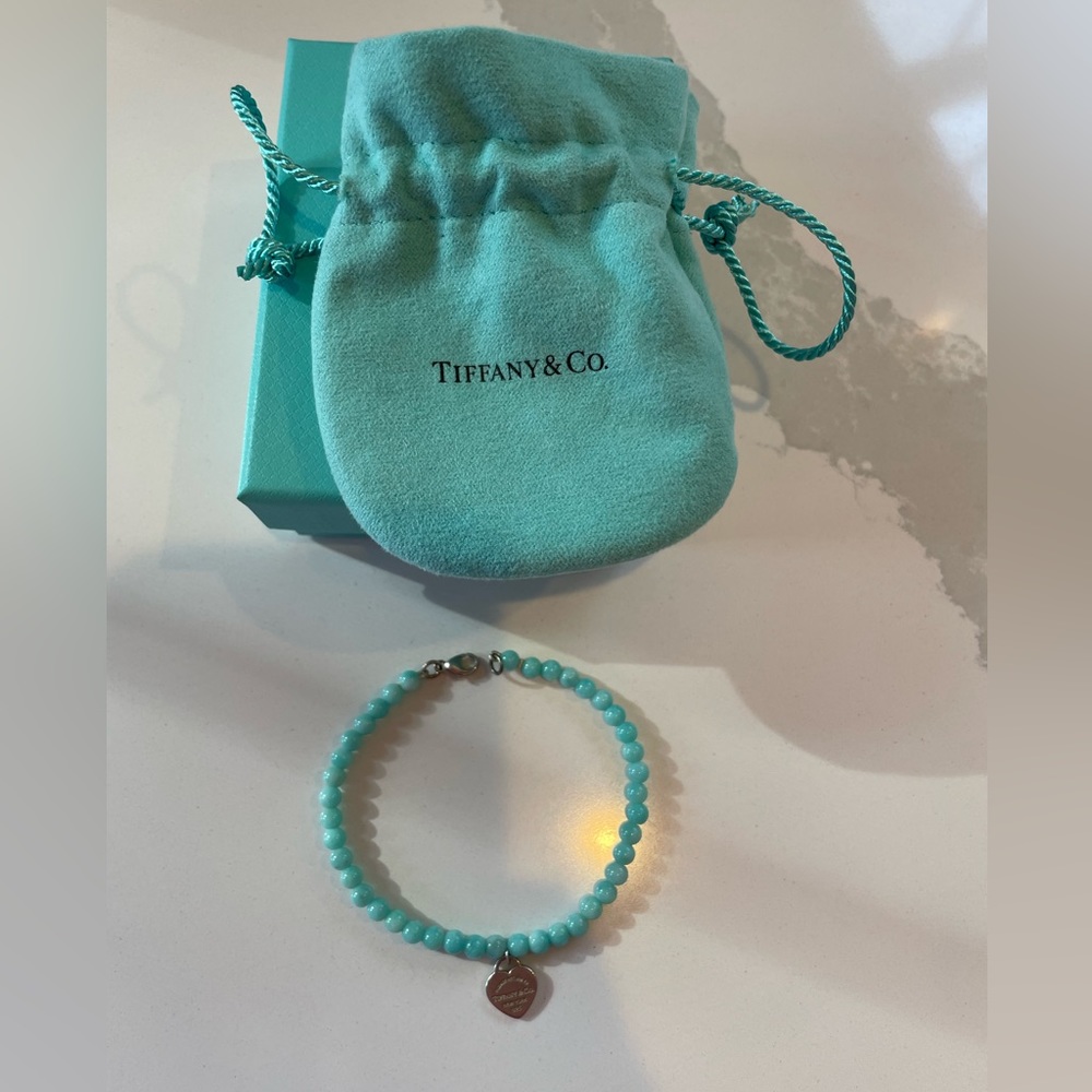 Return to Tiffany’s beaded turquoise heart bracelet
